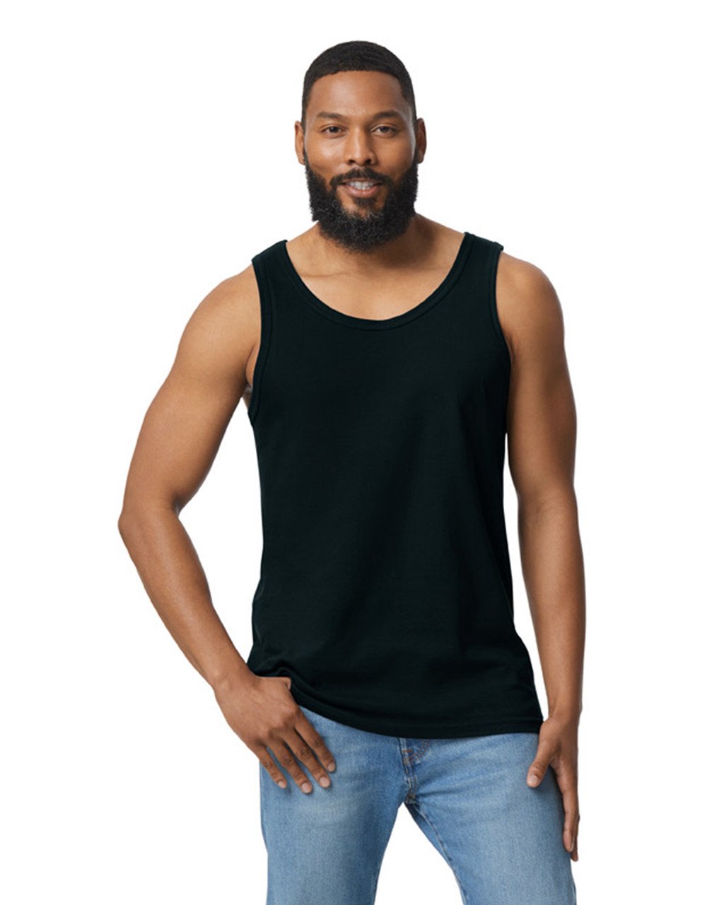 Model wearing a black Gildan Softstyle tank top, front view