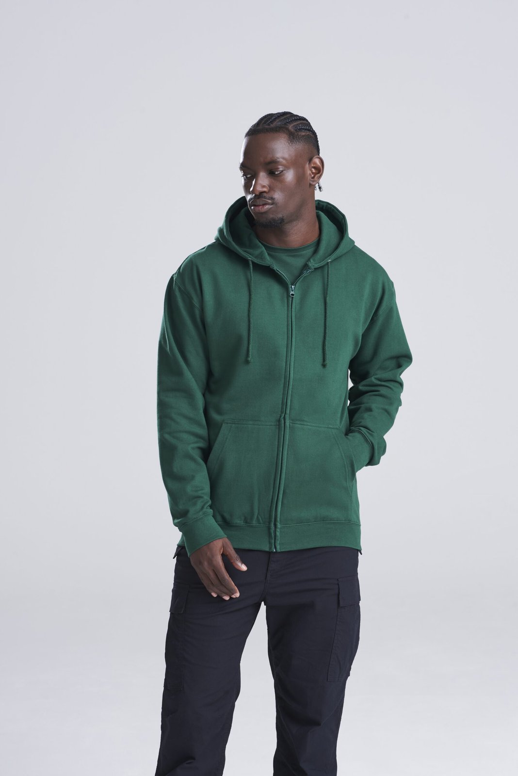 Model wearing a bottle green AWDis Zoodie, front view